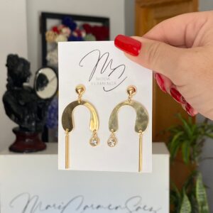 Pendientes de flamenca dorados con un brillo.